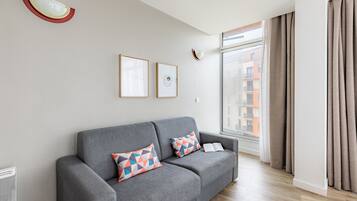 Superior Apartment, 2 Bedrooms | Living area | TV