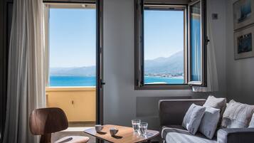 Superior Studio, Sea View | Living area | 24-inch flat-screen TV with satellite channels, plasma TV