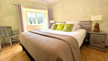 Family Quadruple Room, River View | Premium bedding, in-room safe, individually decorated