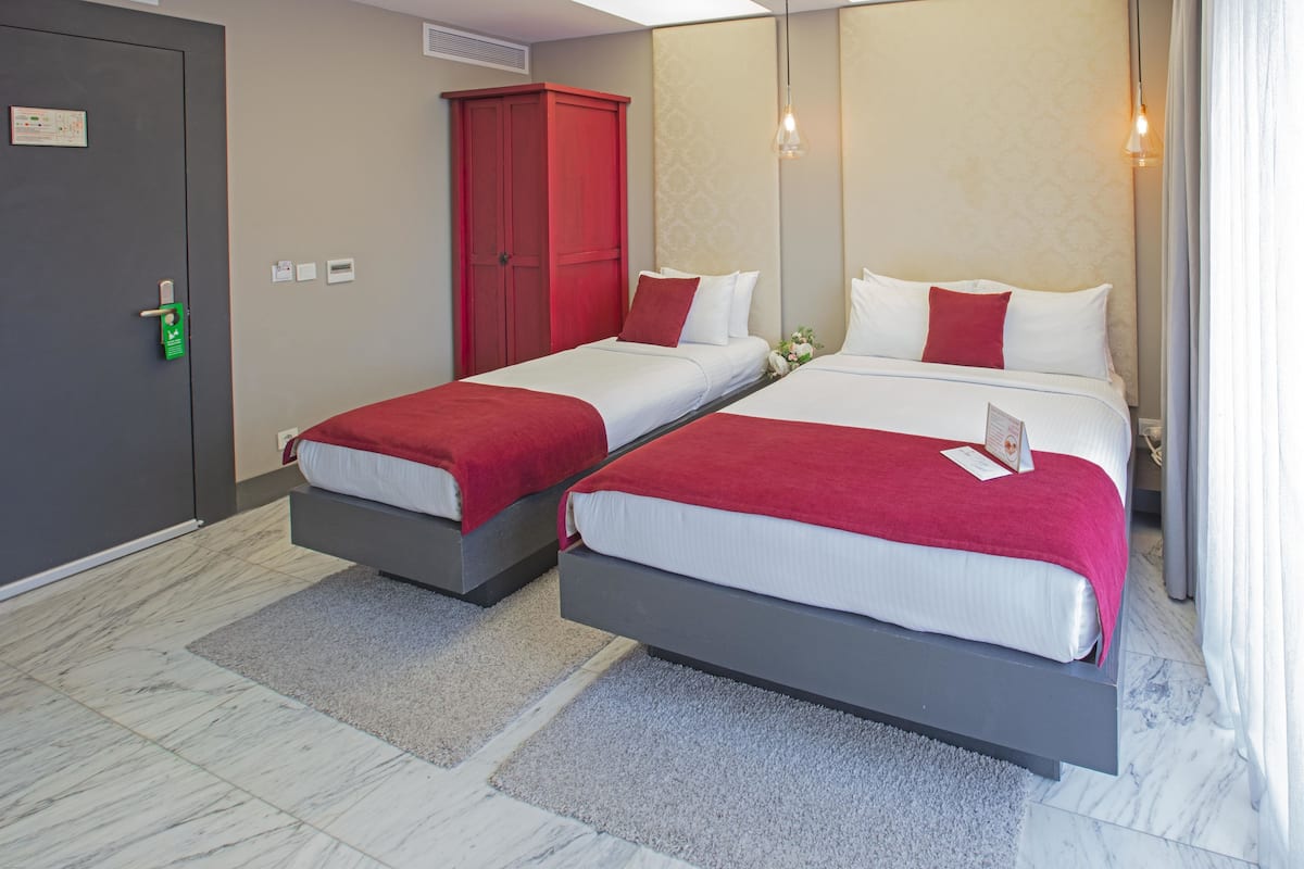 Quarto família, 1 quarto | Frigobar, cofres nos quartos, cortinas blackout, quartos à prova de som