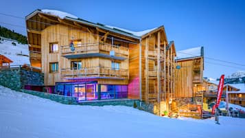 Enjoy breathtaking views from the balconies of this mountain lodge, which offers access to a ski lift.