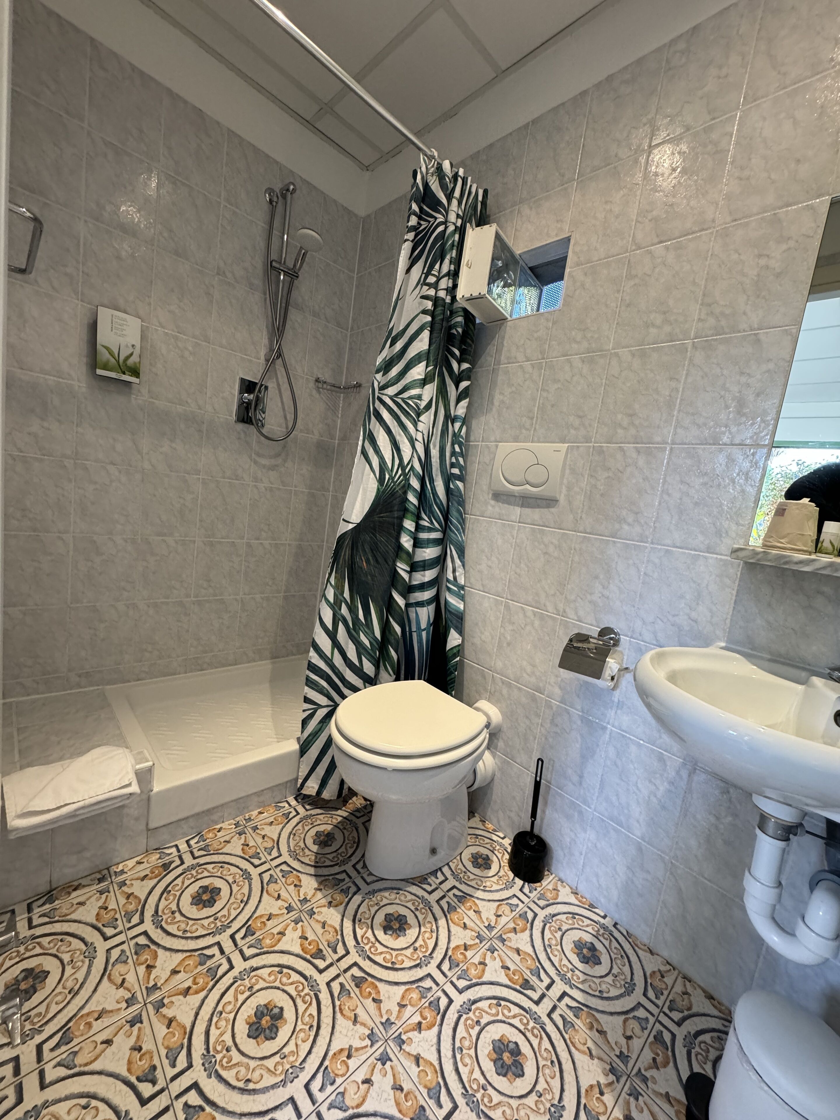 standard double room, garden view | bathroom | shower, hair dryer, towels