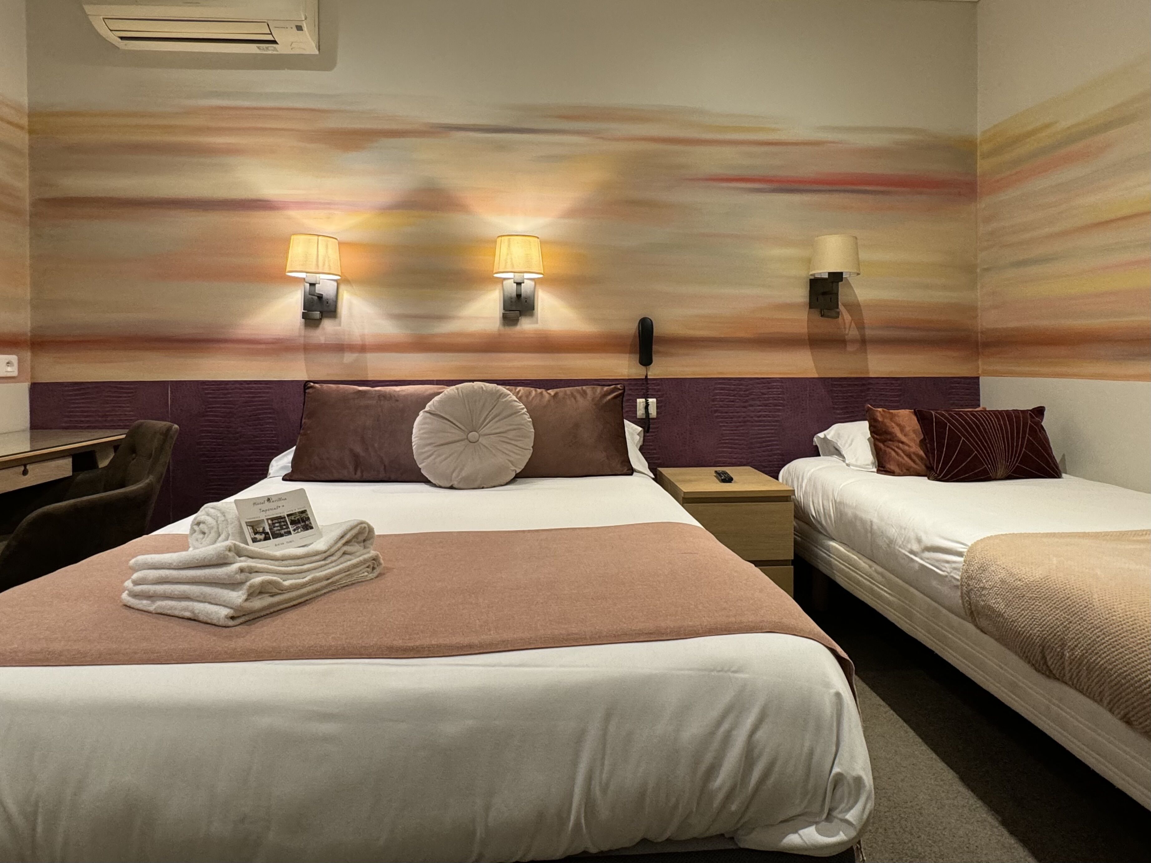 triple room painted wall view | 1 bedroom, premium bedding, in-room safe, soundproofing