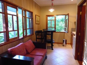 Deluxe Suite | Living area | Flat-screen TV