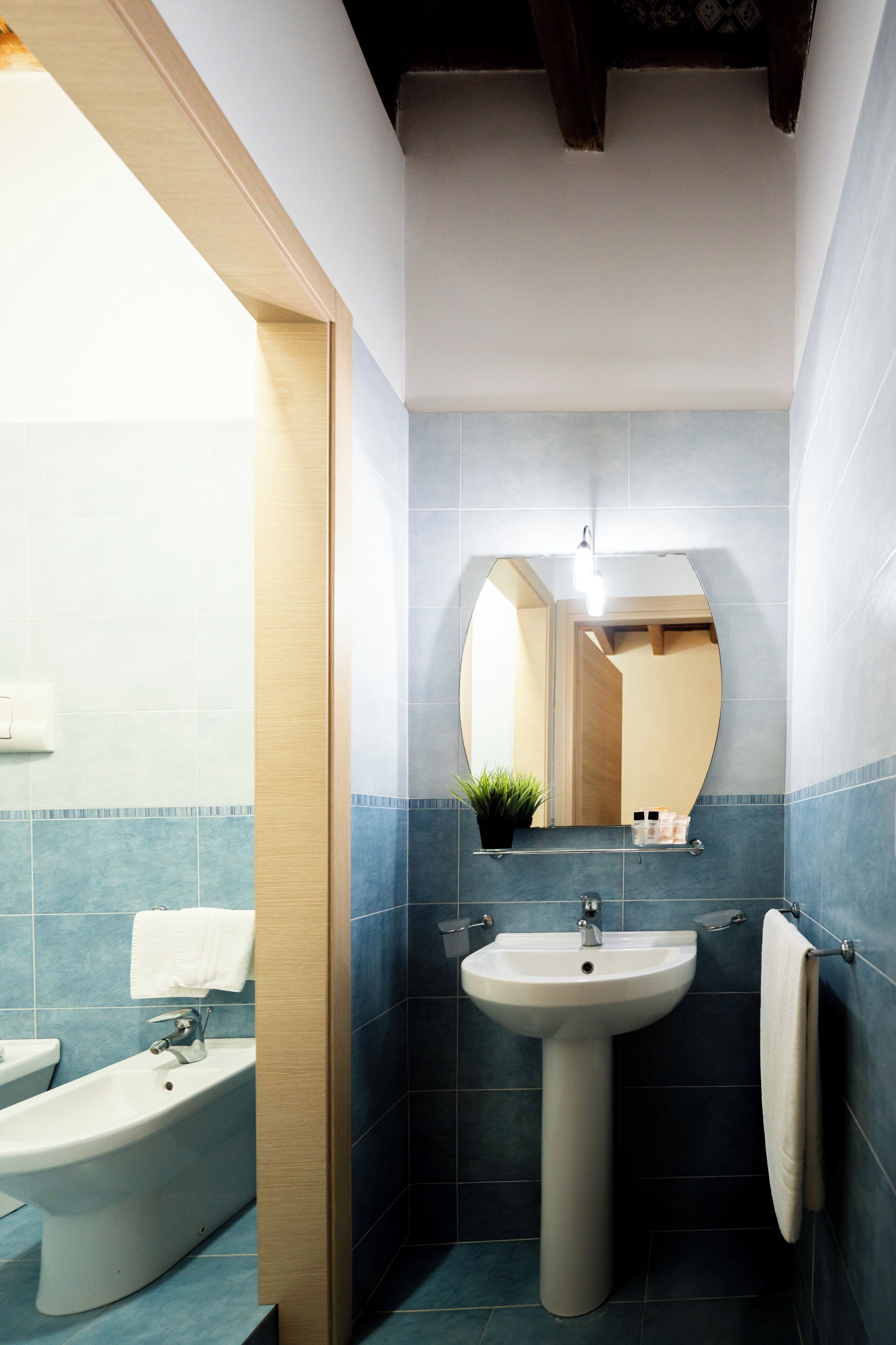 Deluxe Room, City View | Bathroom | Shower, free toiletries, hair dryer, slippers