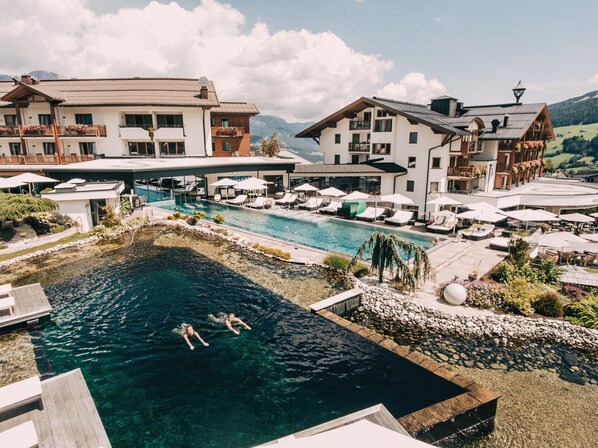 Indoor pool, outdoor pool, pool umbrellas, pool loungers