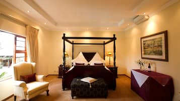 Suite, 1 King Bed | Minibar, in-room safe, desk, free WiFi