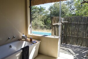 Luxury Suite, River Lodge | Bathroom | Eco-friendly toiletries, hair dryer, towels, soap