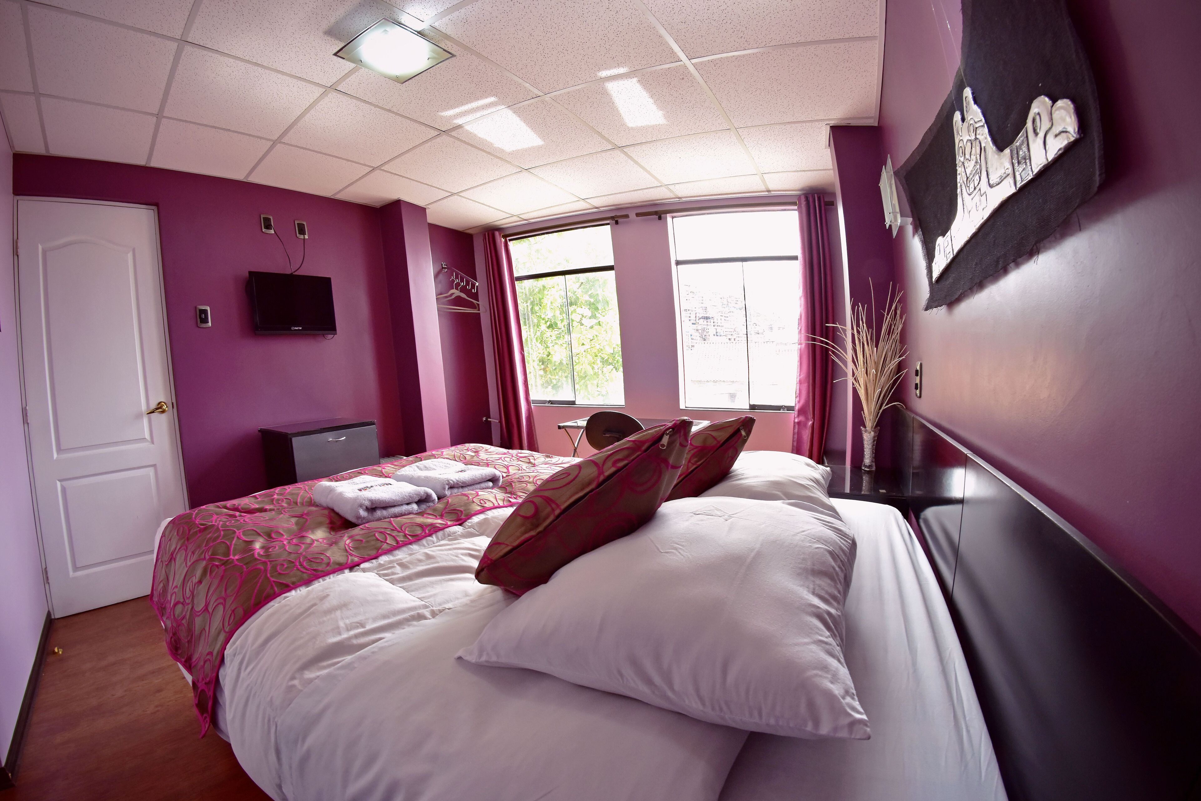 double room | 1 bedroom, in-room safe, individually decorated, desk