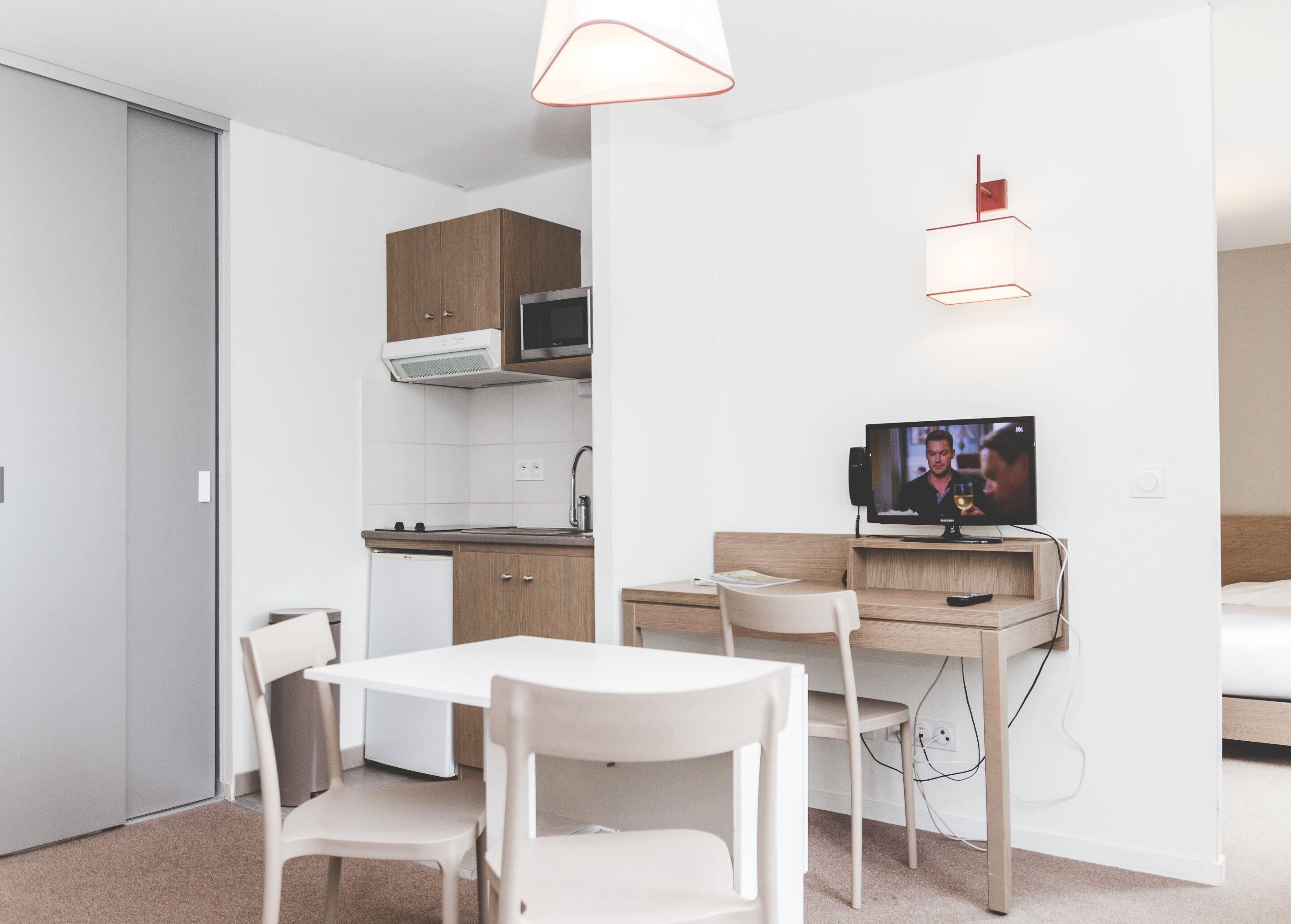 Studio Suite (4 pax) | Living area | 60-cm flat-screen TV with digital channels