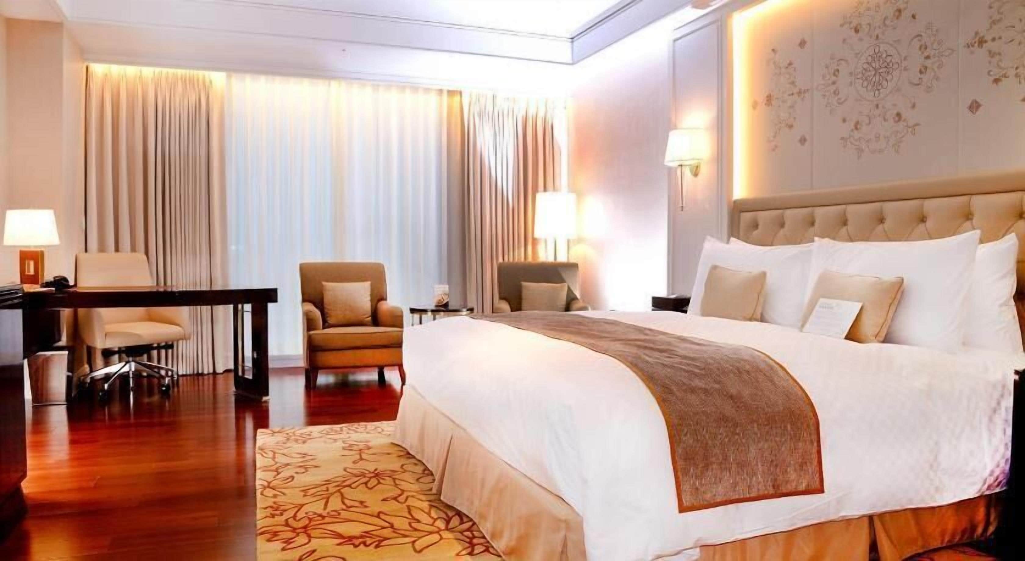 Luxe beddengoed, donsdekens, pillowtop-bedden, een minibar