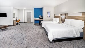 A hotel room with two beds, a desk with a chair, a TV, and a bathroom. - Holiday Inn Express Hotel & Suites Denver North - Thornton by IHG (Thornton)