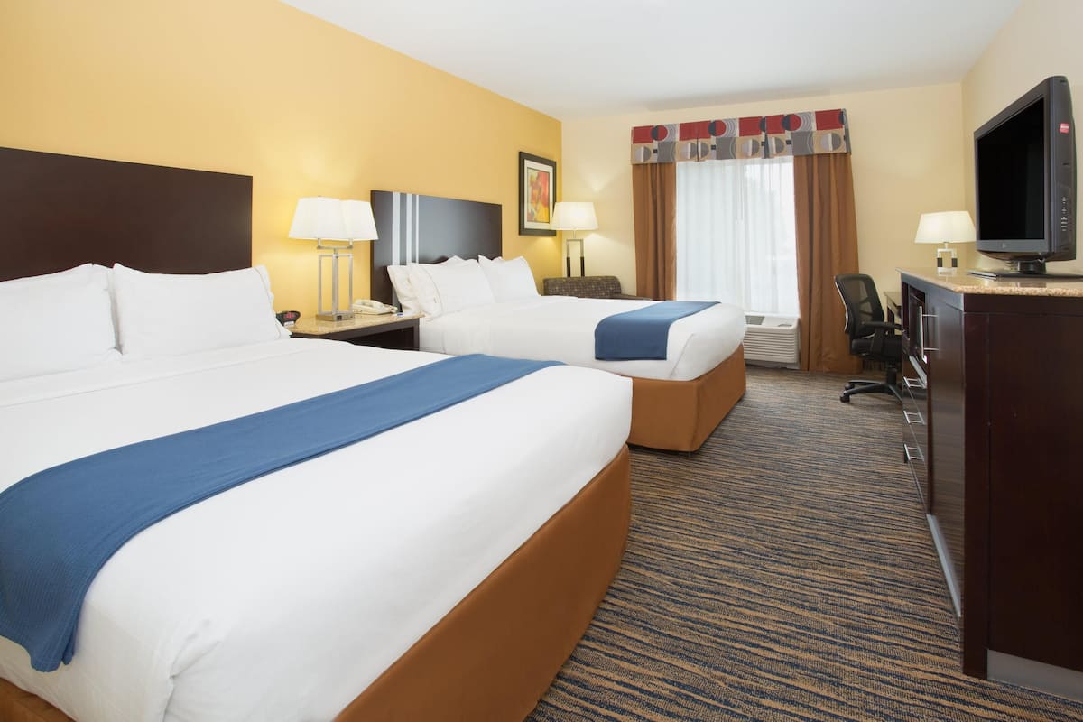 In-room safe, blackout drapes, iron/ironing board, cribs (free)
