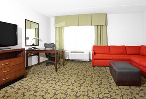 Suite, 1 King Bed | Living area | 37-inch LCD TV with cable channels, TV, MP3 dock