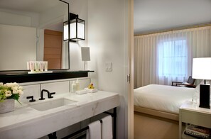 Designer toiletries, hair dryer, bathrobes, towels