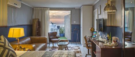 Penthouse Suite for 3 Adults, Sea View | Pillowtop beds, in-room safe, individually decorated