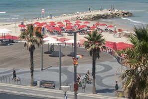Beach nearby, white sand, beach towels - TLV 88 Sea Hotel (Tel Aviv)