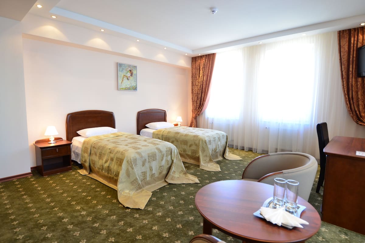 1 Schlafzimmer, hochwertige Bettwaren, Minibar, Zimmersafe