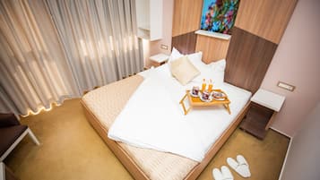Premium bedding, down duvets, memory-foam beds, minibar