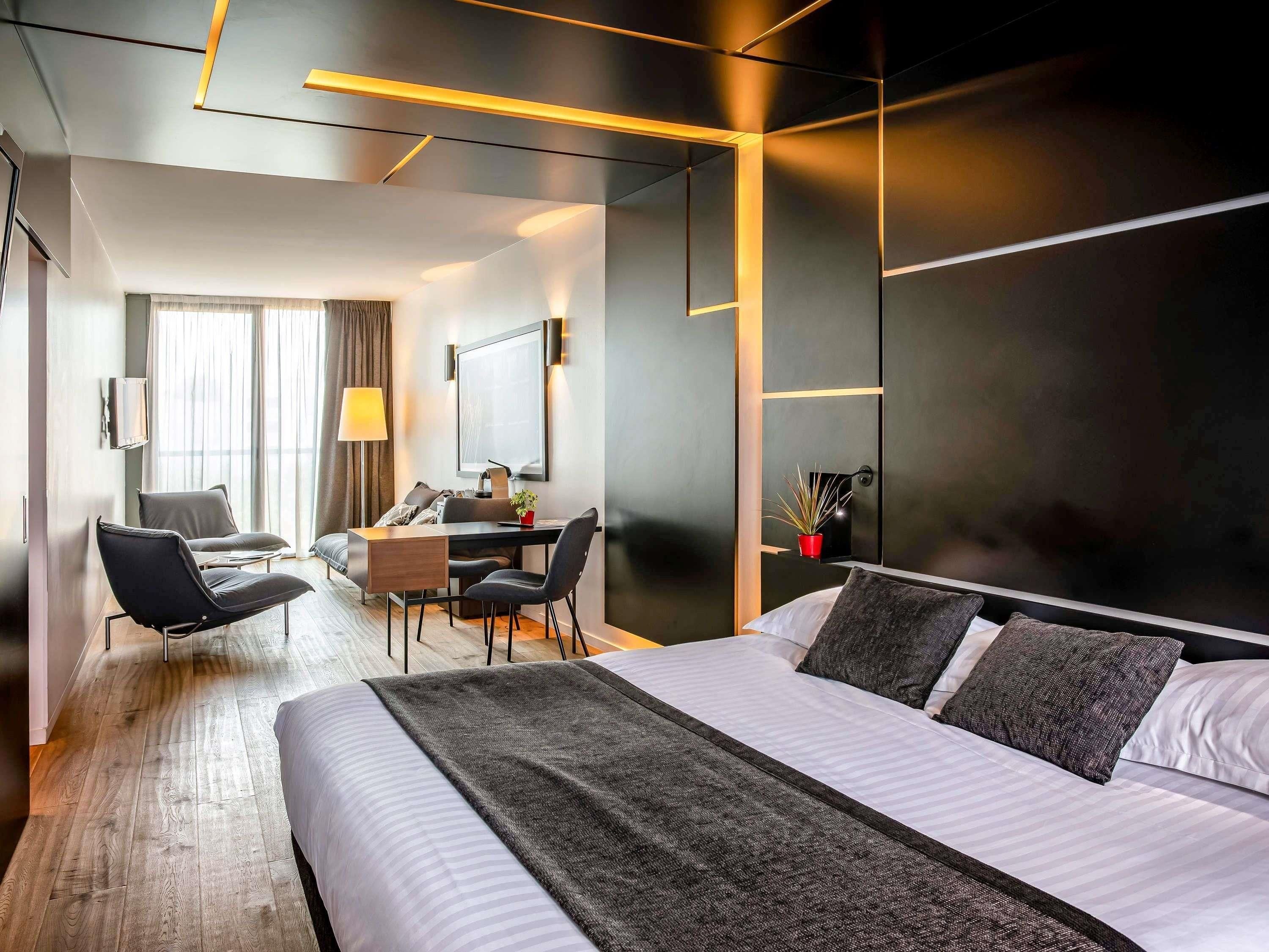 Junior suite, 1 kingsize bed met slaapbank | Luxe beddengoed, een kluis op de kamer, een bureau
