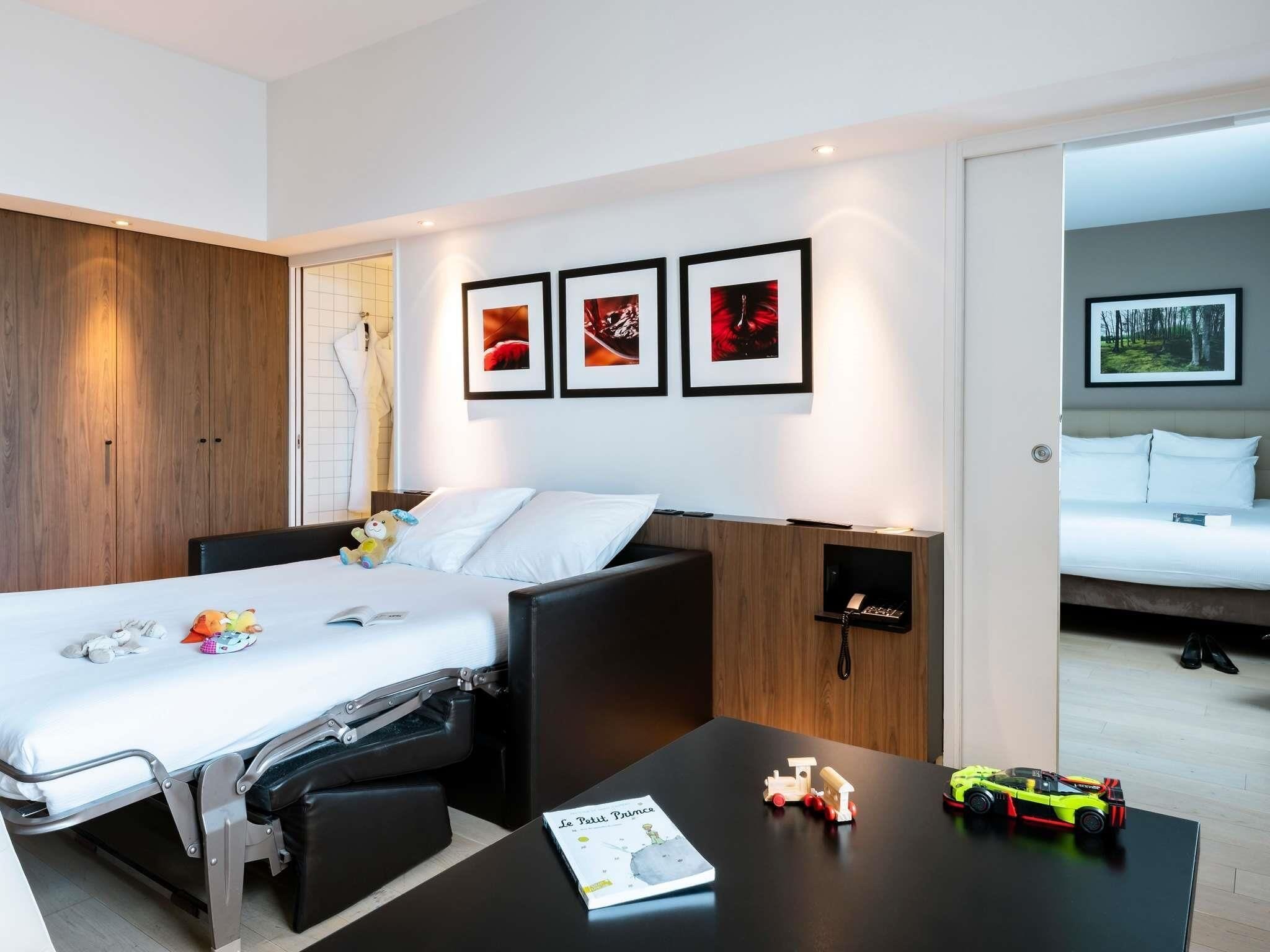 Suite – superior, 1 dobbeltseng med sovesofa | Sengetøy av topp kvalitet, safe på rommet og skrivebord