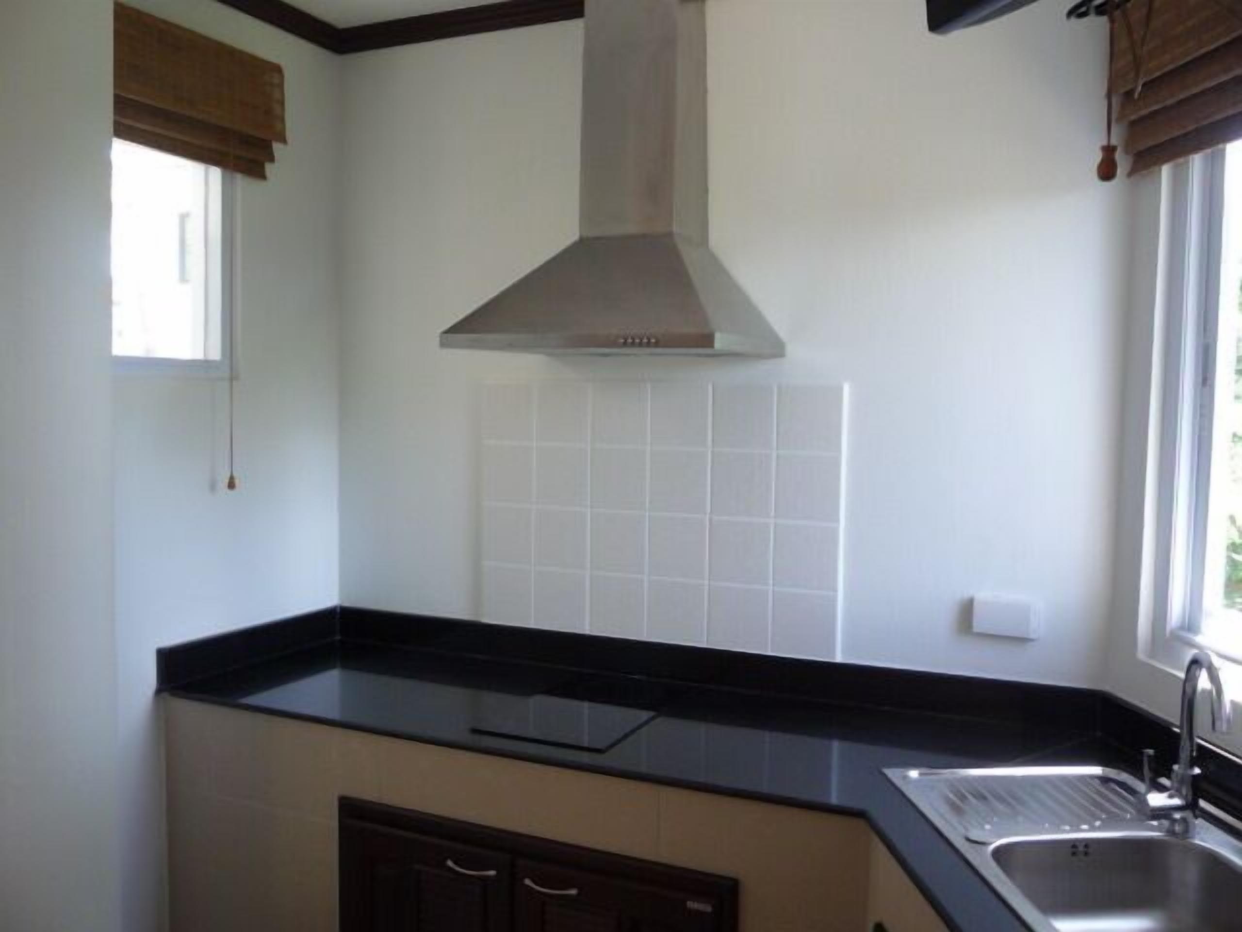 full-sized fridge, microwave, stovetop, electric kettle