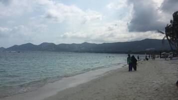 On the beach, white sand