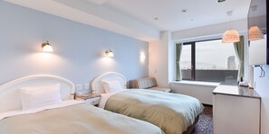 Habitación con 2 camas individuales, fumadores | Caja fuerte, escritorio, wifi gratis y ropa de cama