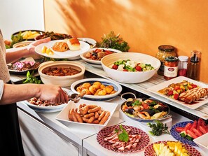 A buffet table with various dishes including seafood, salads, and appetizers. - Kobe Sannomiya Union Hotel (Kobe)