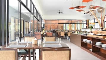 Breakfast, lunch, dinner served; international cuisine, pool views