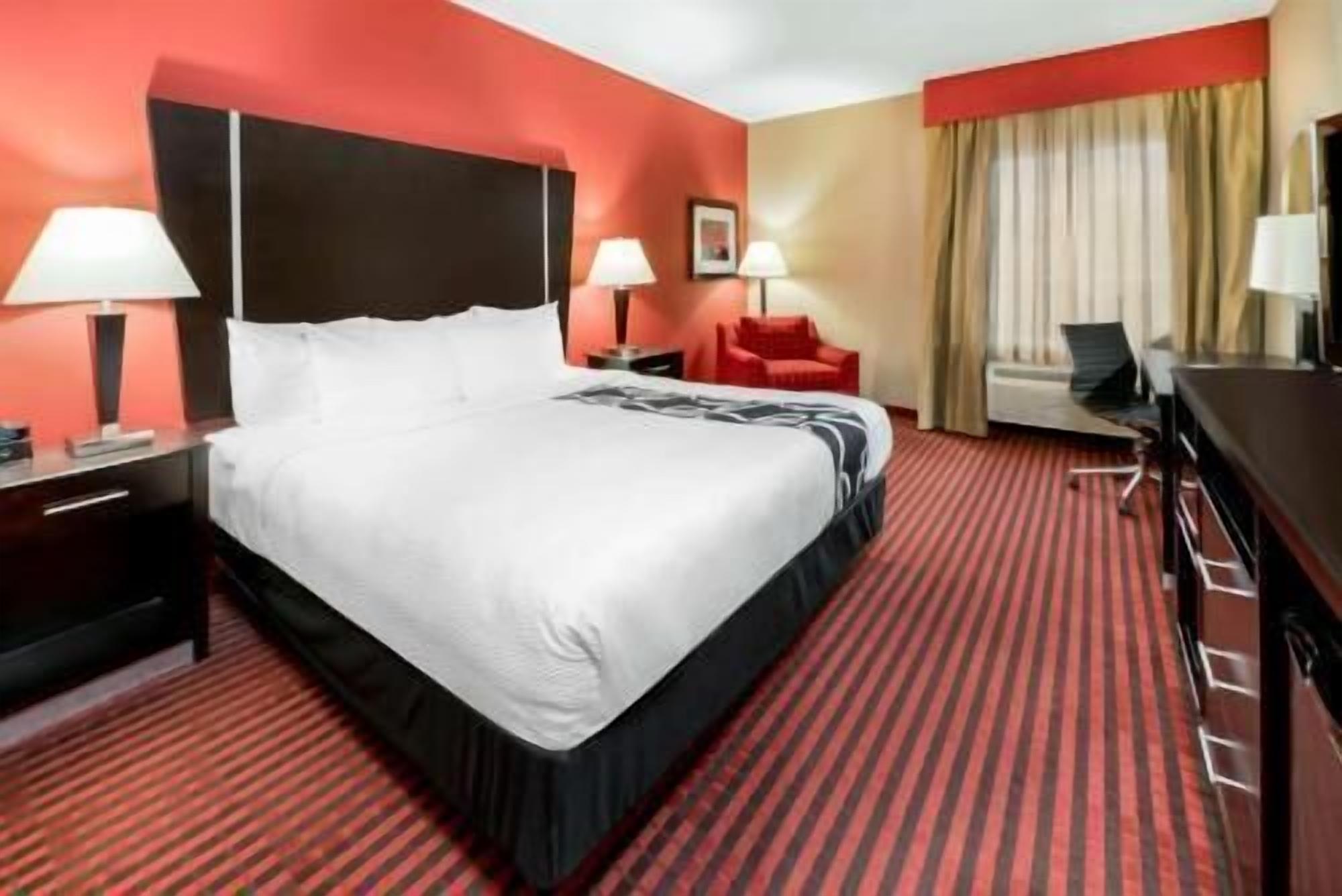 Premium bedding, desk, iron/ironing board, free cribs/infant beds