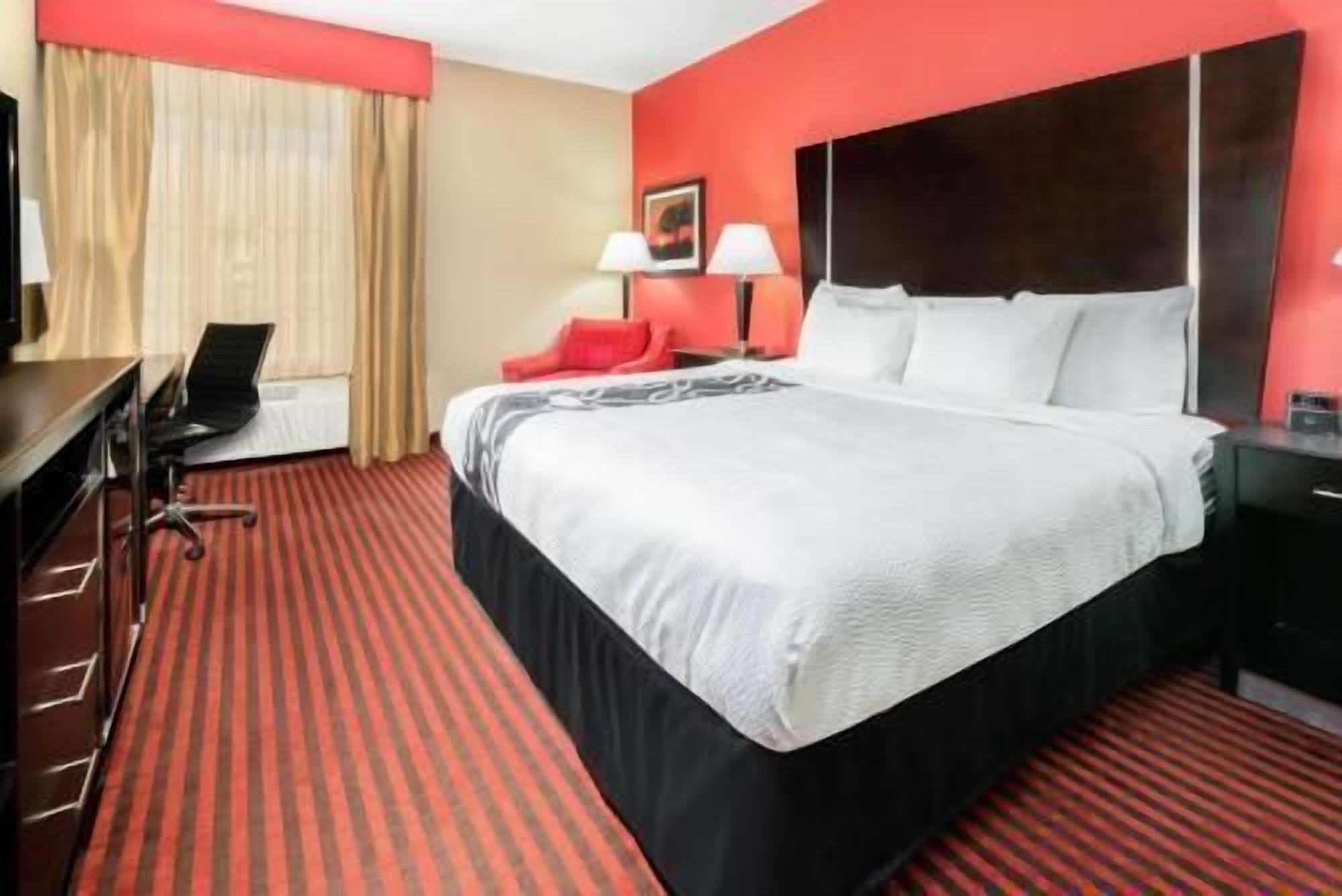 Premium bedding, desk, iron/ironing board, free cribs/infant beds