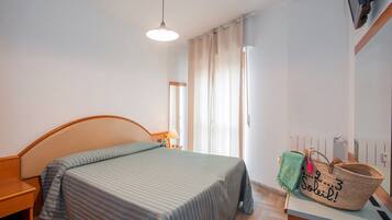 Standard Room | Premium bedding, down duvets, desk, laptop workspace