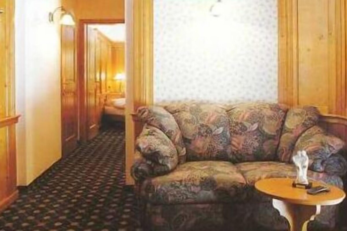 Suite superior | Sala de estar