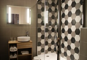 Shower, free toiletries, hair dryer, towels