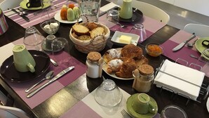 A breakfast buffet with various pastries, bread, and condiments. - B&B La Casa di Paola (Trapani)