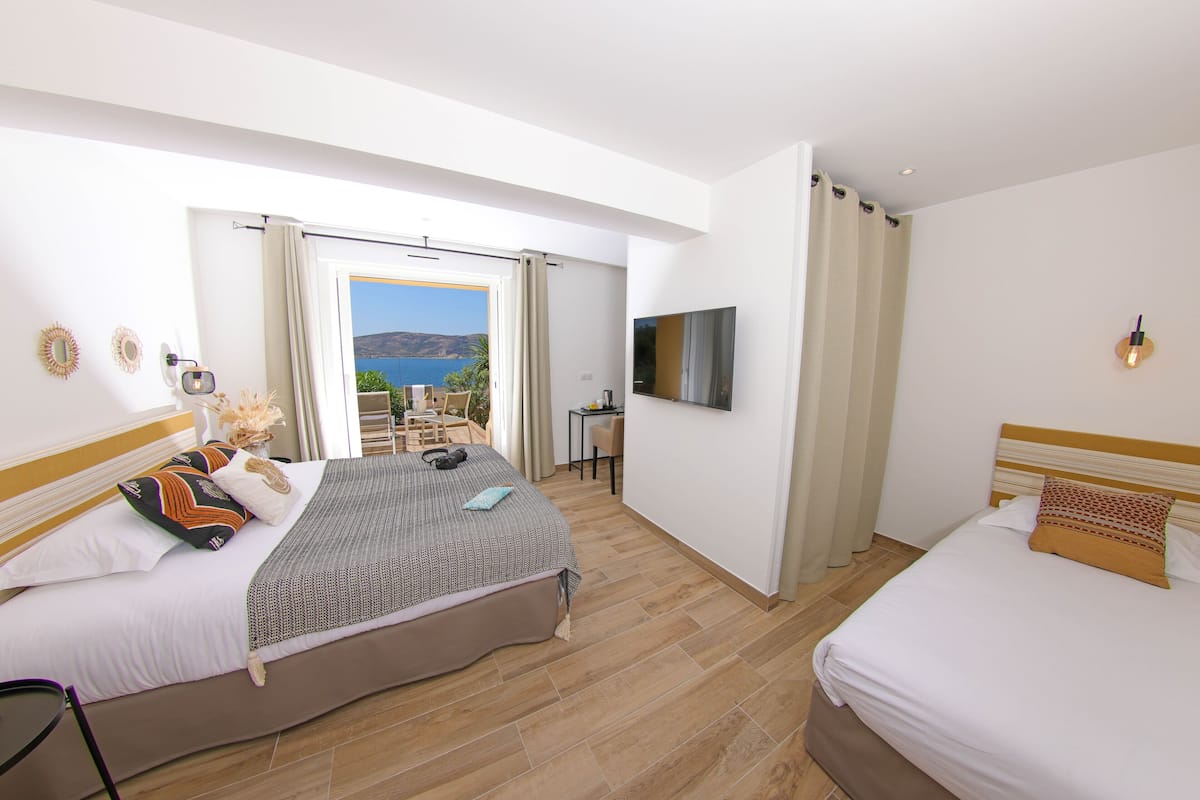 Panoramic Triple Room, Balcony, Sea View | 2 bedrooms, premium bedding, in-room safe, individually decorated