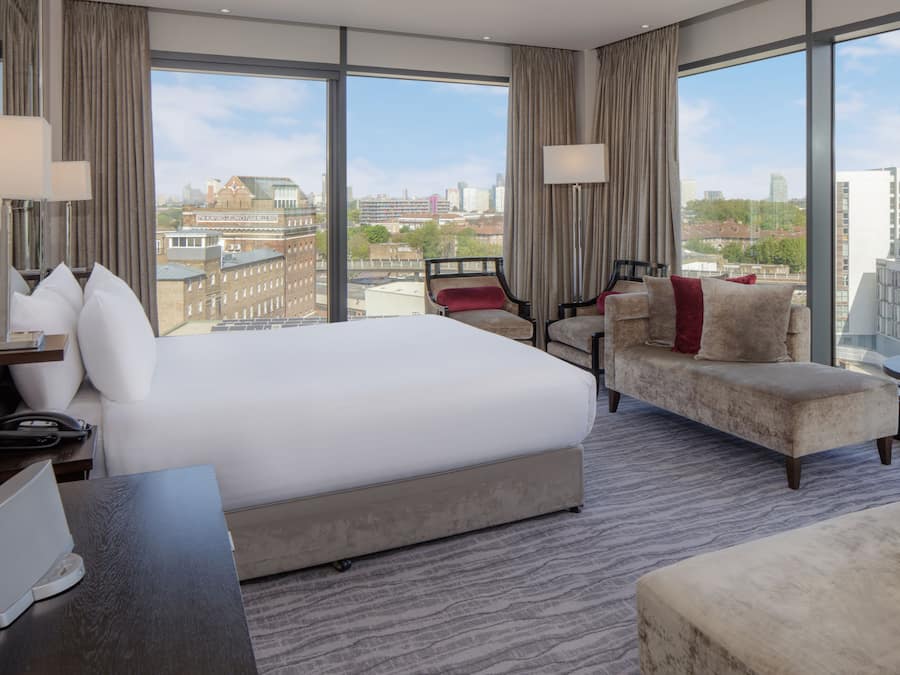 Junior Suite, 1 King Bed, Non Smoking | In-room safe, desk, soundproofing, iron/ironing board