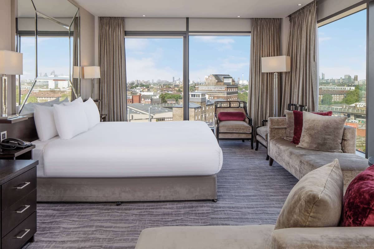 Junior Suite, 1 King Bed, Non Smoking | In-room safe, desk, soundproofing, iron/ironing board