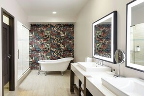 Shower, designer toiletries, hair dryer, towels