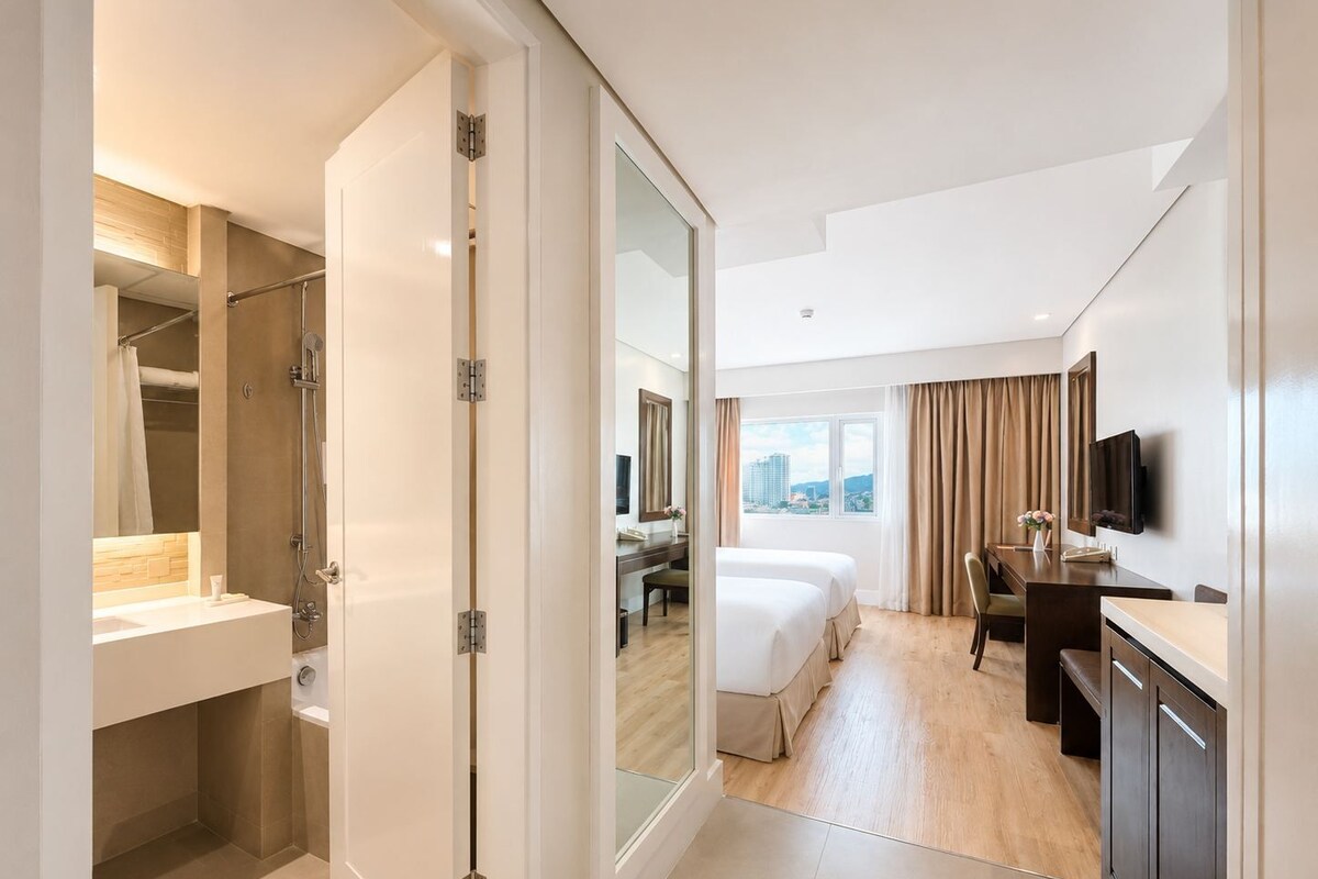 Premium bedding, memory-foam beds, minibar, in-room safe