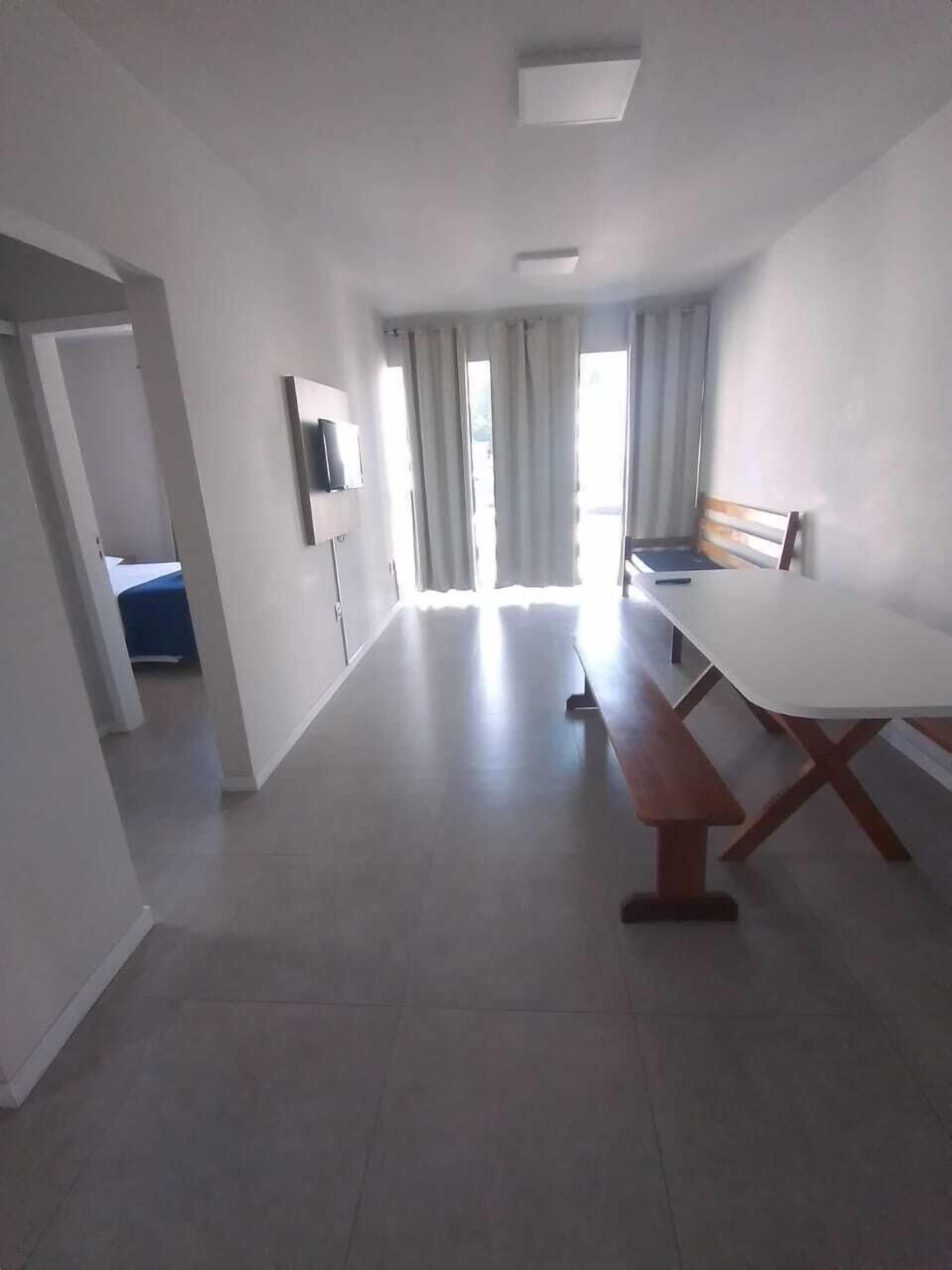 Standard Room (Quintuplo) | Living area | TV