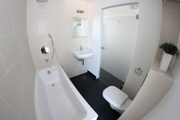 Rainfall showerhead, free toiletries, hair dryer, heated floors