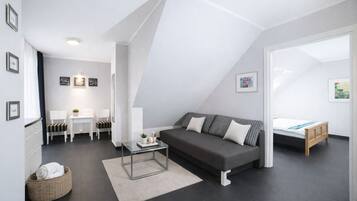 Deluxe-Apartment, 1 Schlafzimmer | Bettwäsche aus ägyptischer Baumwolle, hochwertige Bettwaren, Zimmersafe