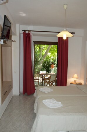 Apartamento família, 2 quartos | Individualmente decorados, Wi-Fi de cortesia, roupa de cama