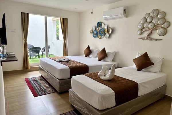 Family Room | Down comforters, individually decorated, individually furnished