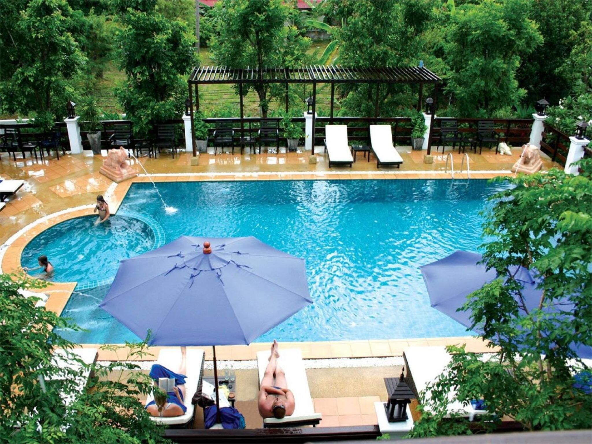 outdoor pool, pool umbrellas, pool loungers