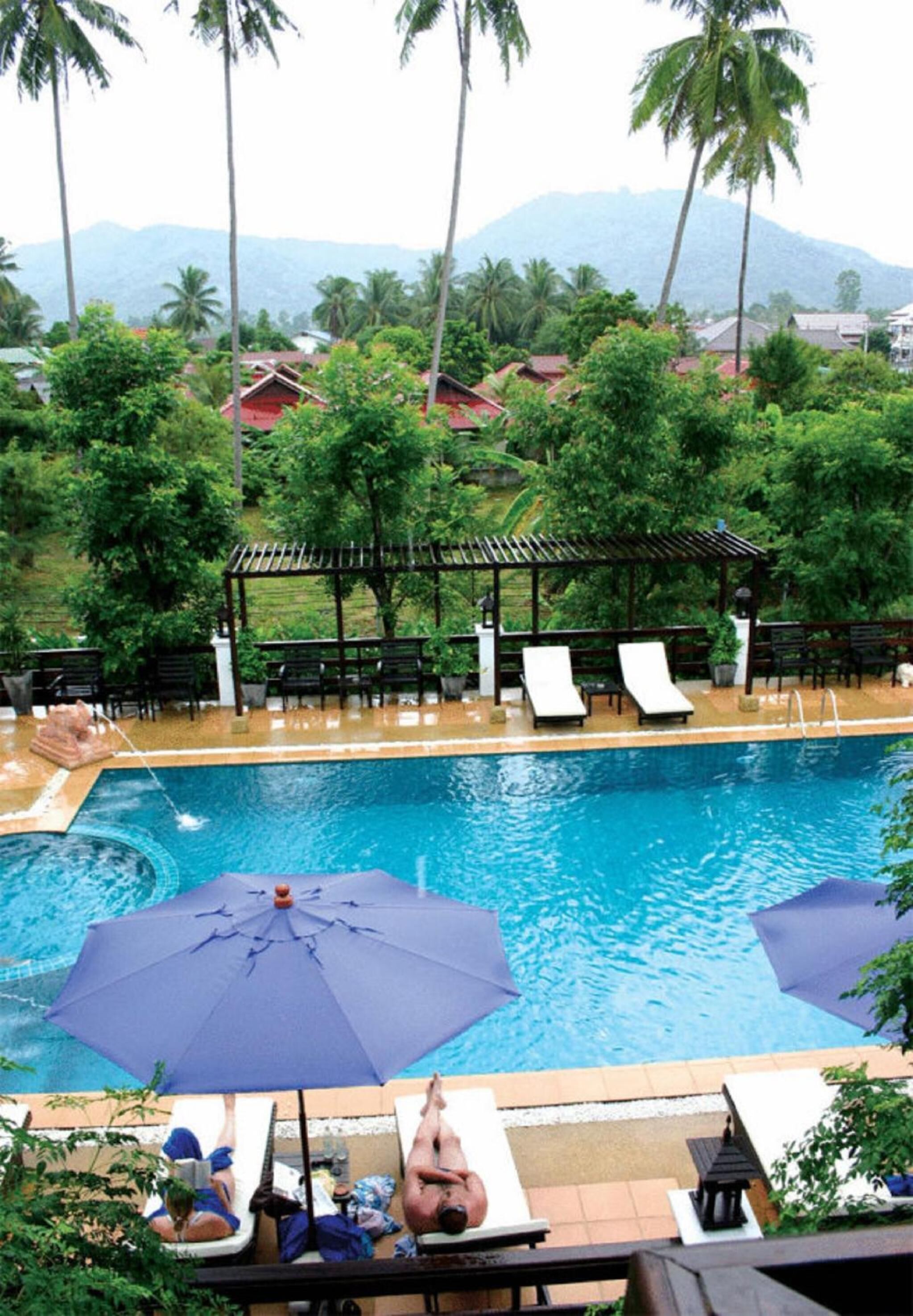 outdoor pool, pool umbrellas, pool loungers