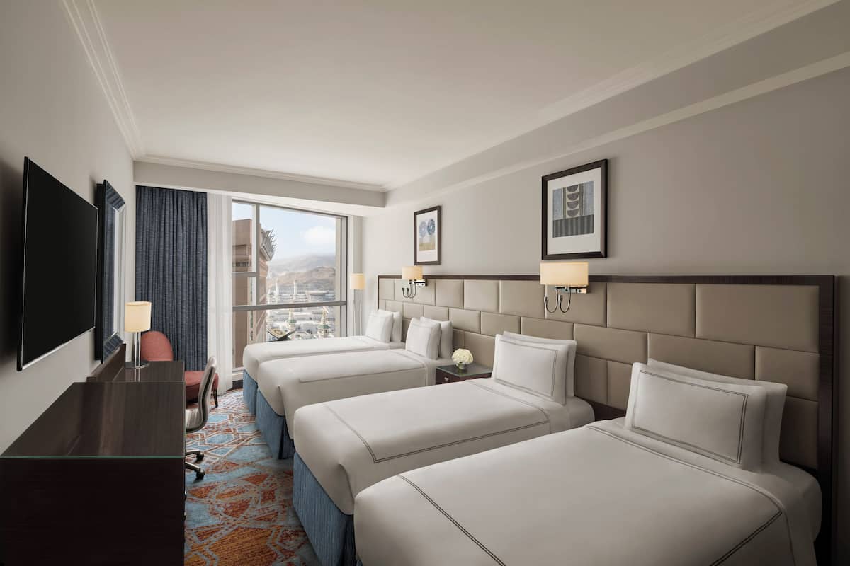Classic Room (Quad bed, Haram Partial View) | Hypo-allergenic bedding available, in-room safe, desk, laptop workspace