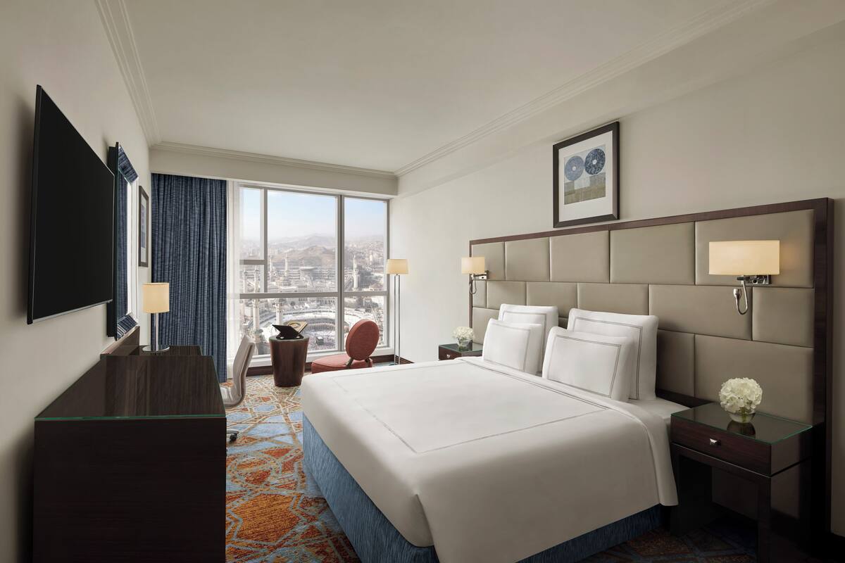 Hypo-allergenic bedding available, in-room safe, desk, laptop workspace